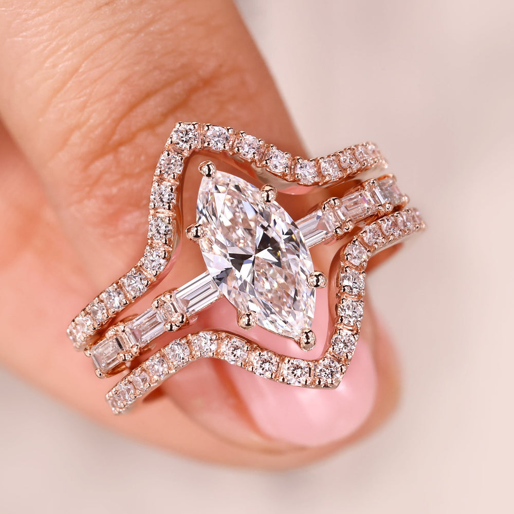 Marquise ring with wedding band in rose gold bridal set.