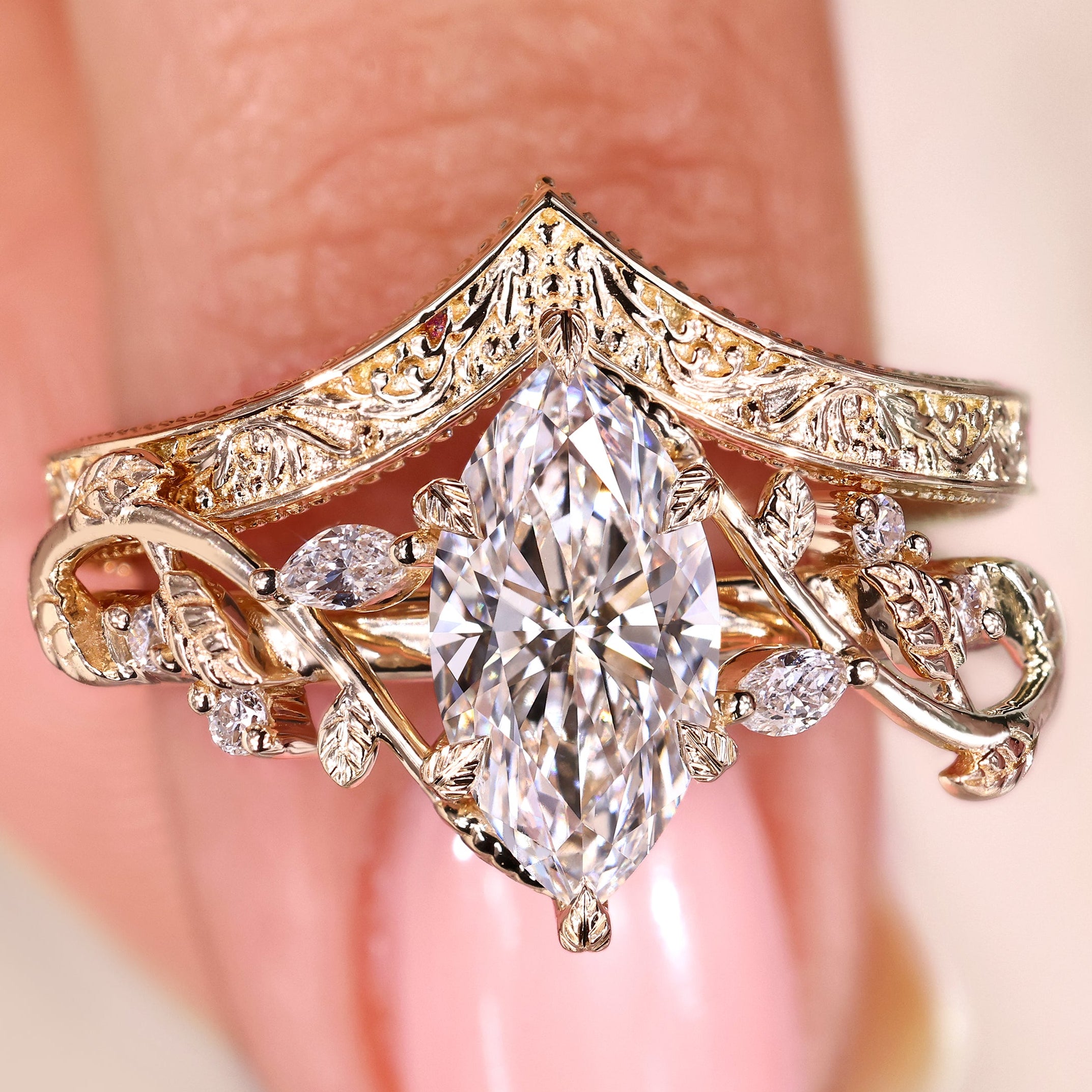 Marquise engagement ring set with round side stones accents
