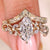 Marquise engagement ring set with round side stones accents

