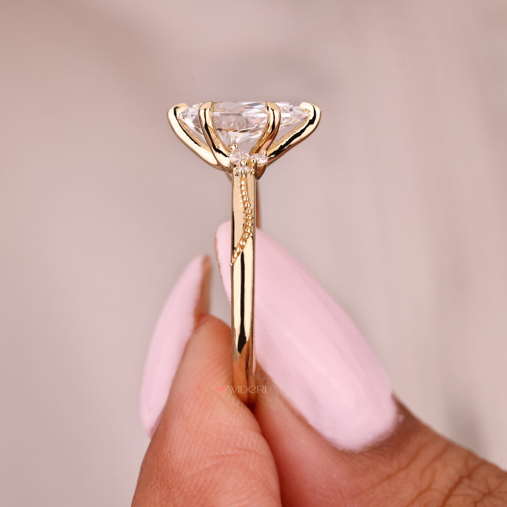 IGI certified pear diamond ring with trellis setting design
