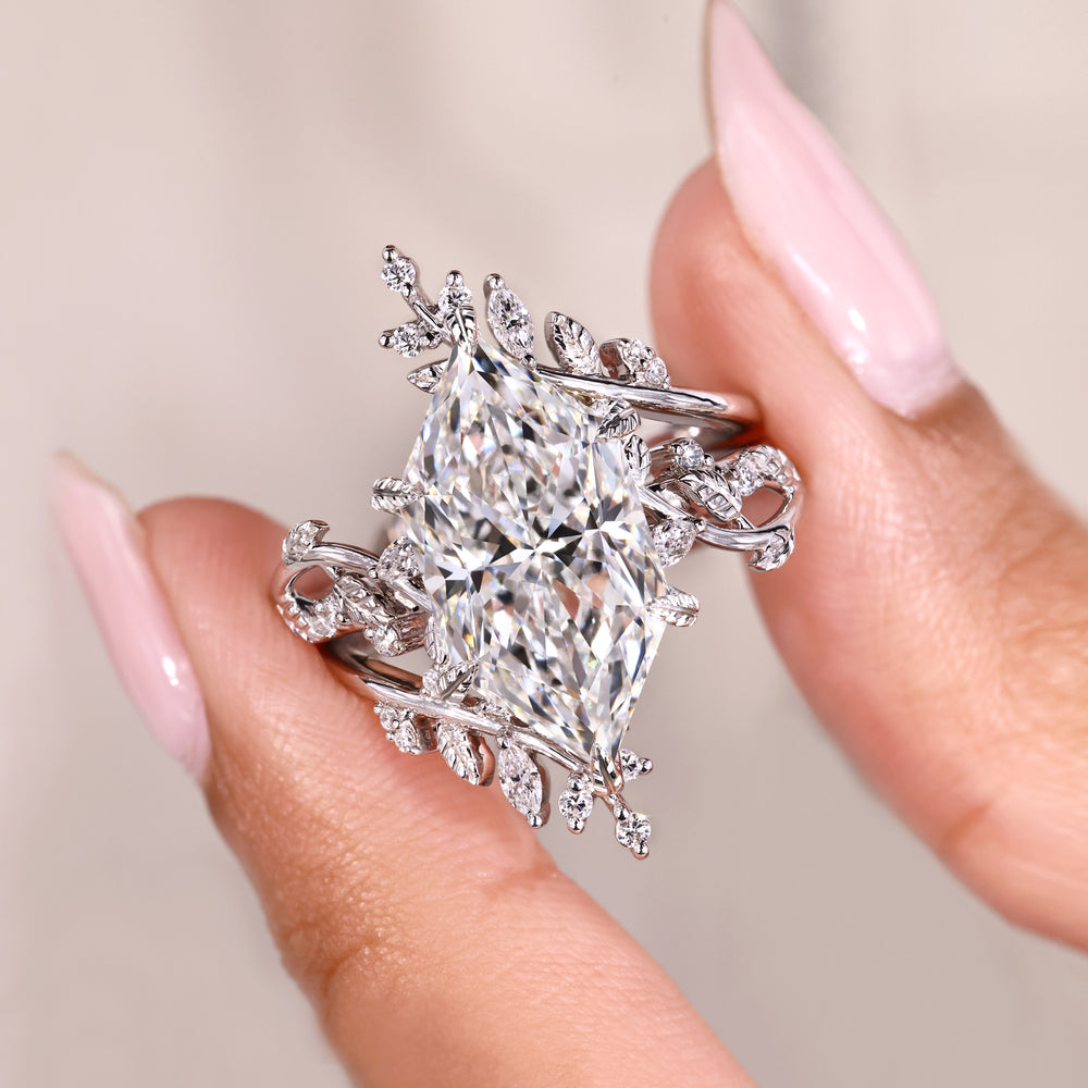 Open gap enhancer ring with marquise diamonds.
