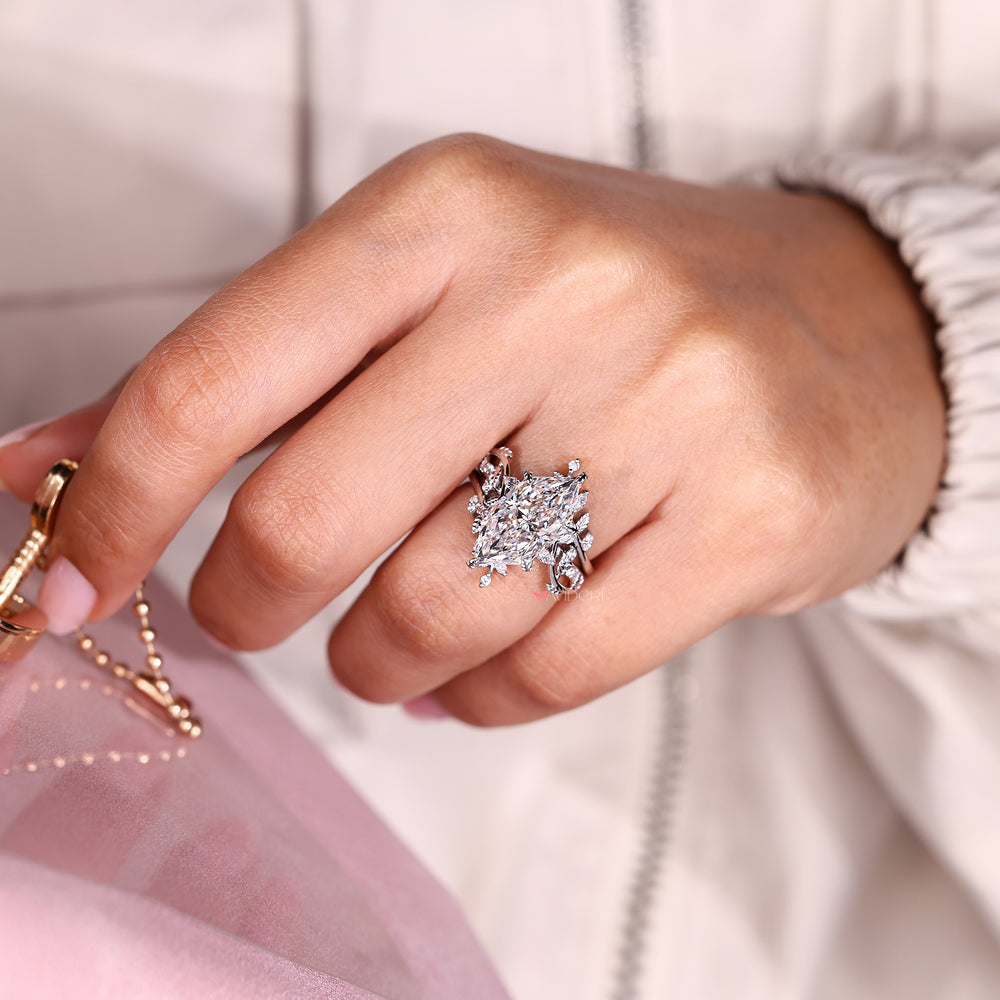 Marquise ring with round band open gap style.
