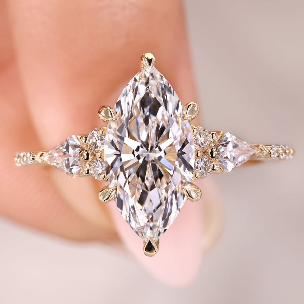 Marquise cut diamond engagement ring with muse setting.