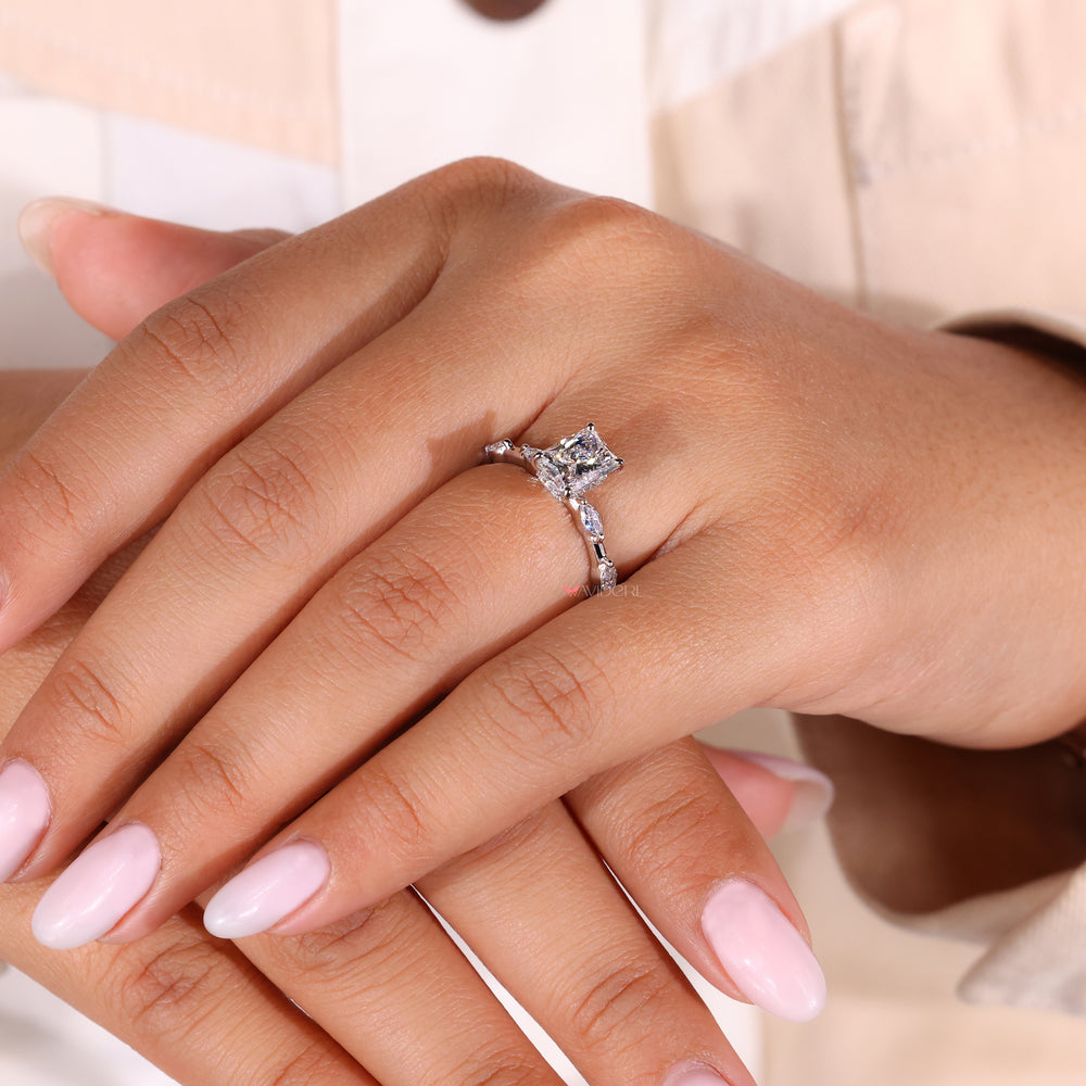 Hidden halo ring with a radiant engagement ring for added brilliance.
