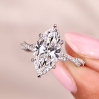 Marquise Cut Engagement Ring With Twisted Pave Setting