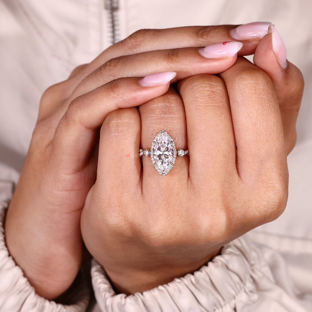 Handmade vintage engagement ring with moissanite halo.