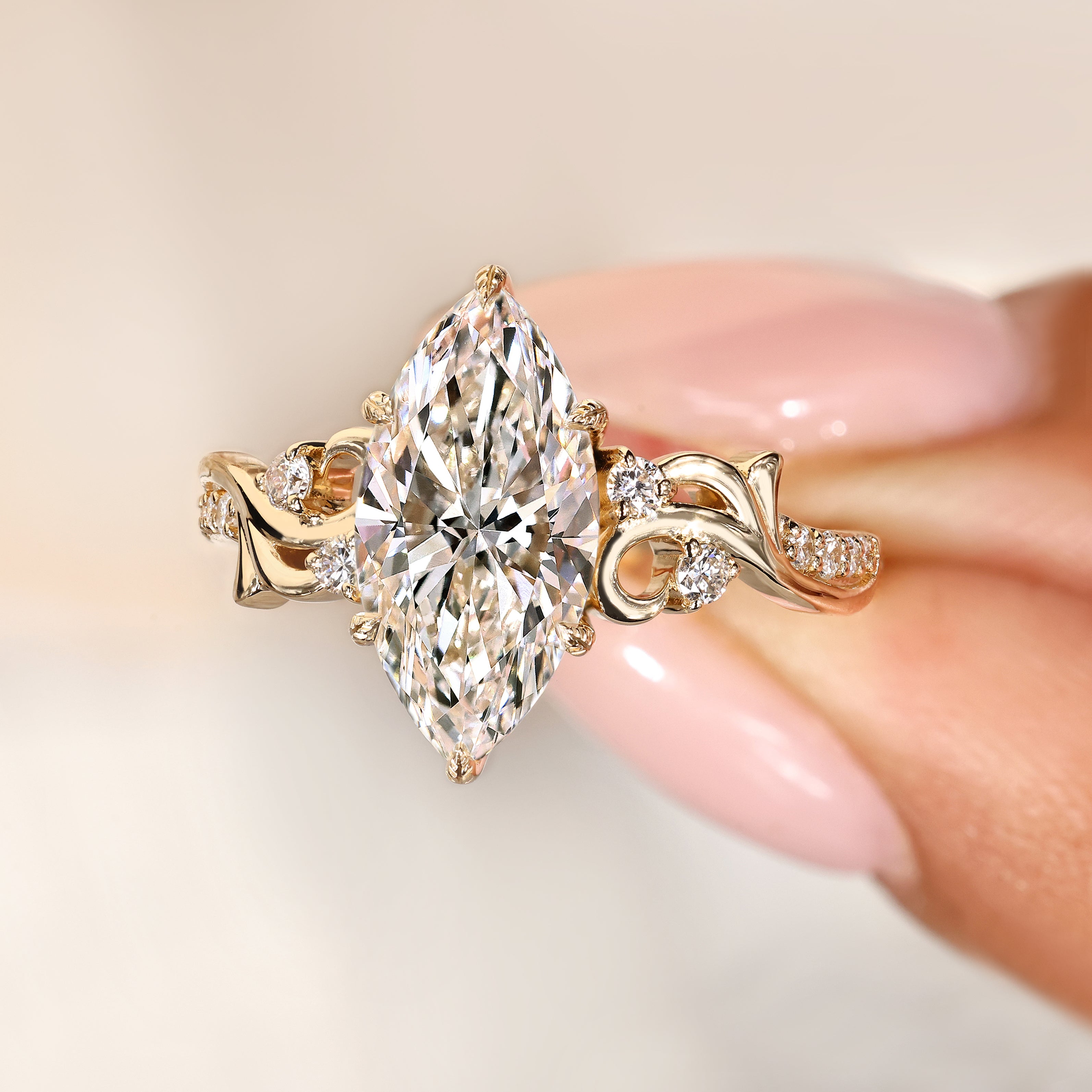 Fantasy engagement ring with marquise center diamond and round accents
