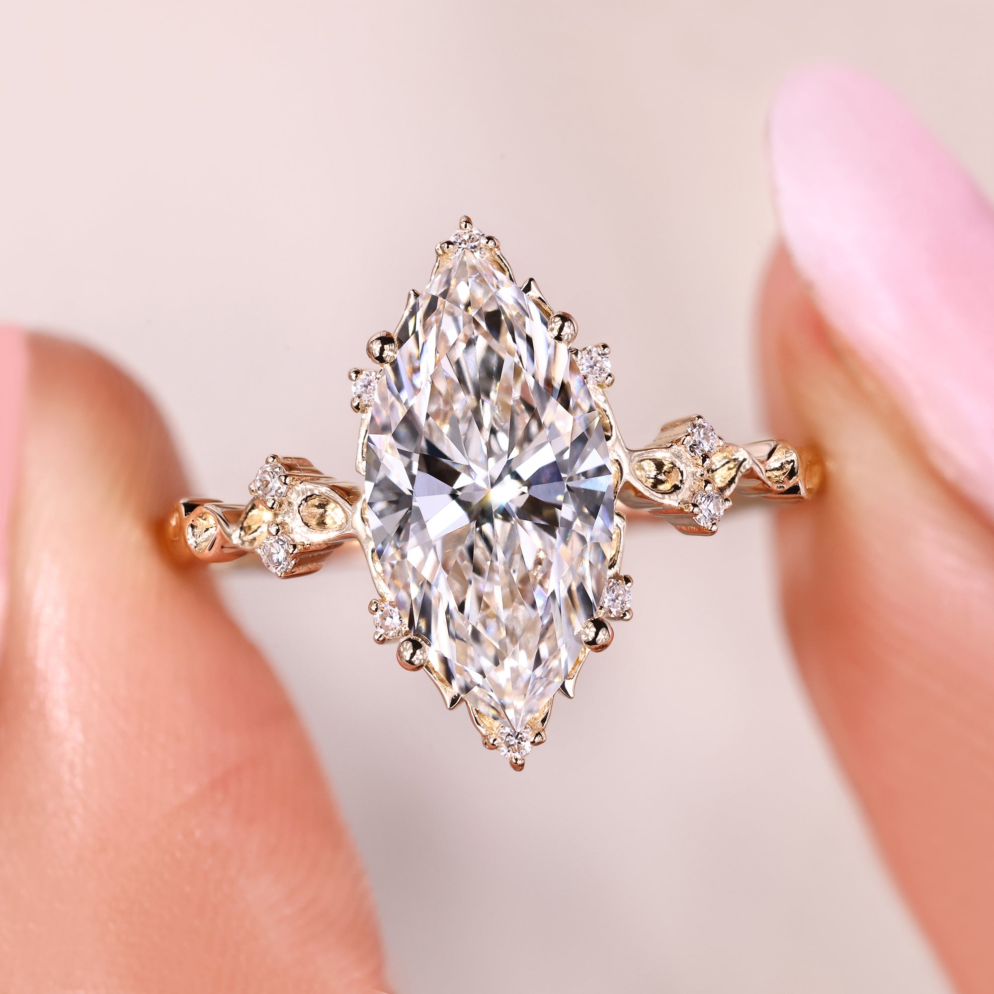Marquise cluster diamond ring in yellow gold.