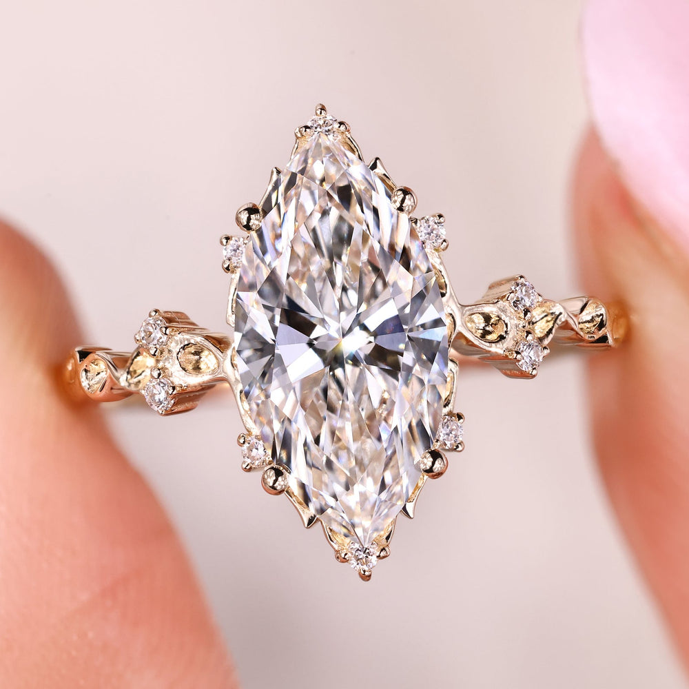 Marquise cluster diamond ring in yellow gold.