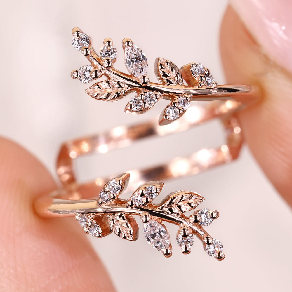 Nature inspired wedding band with a marquise cut design.