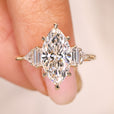 Marquise lab grown diamond ring with baguette side stones.

