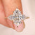 Marquise lab grown diamond ring with baguette side stones.
