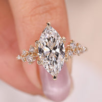 Marquise and Round Diamond Engagement Ring In Yellow Gold
