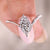 Marquise diamond ring with compass prong setting.
