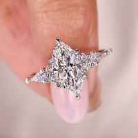 Marquise Diamond Ring With Round And Kite Side Stones