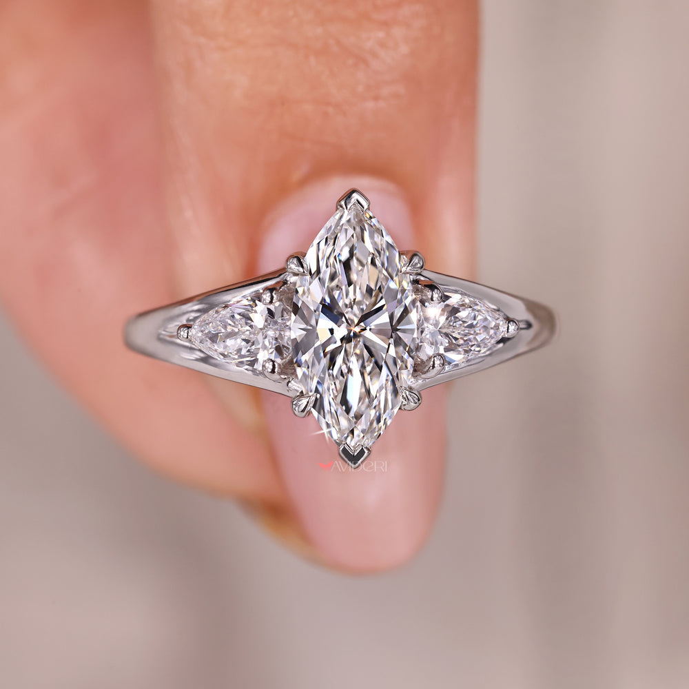 Marquise engagement ring with 4-prong claw setting.