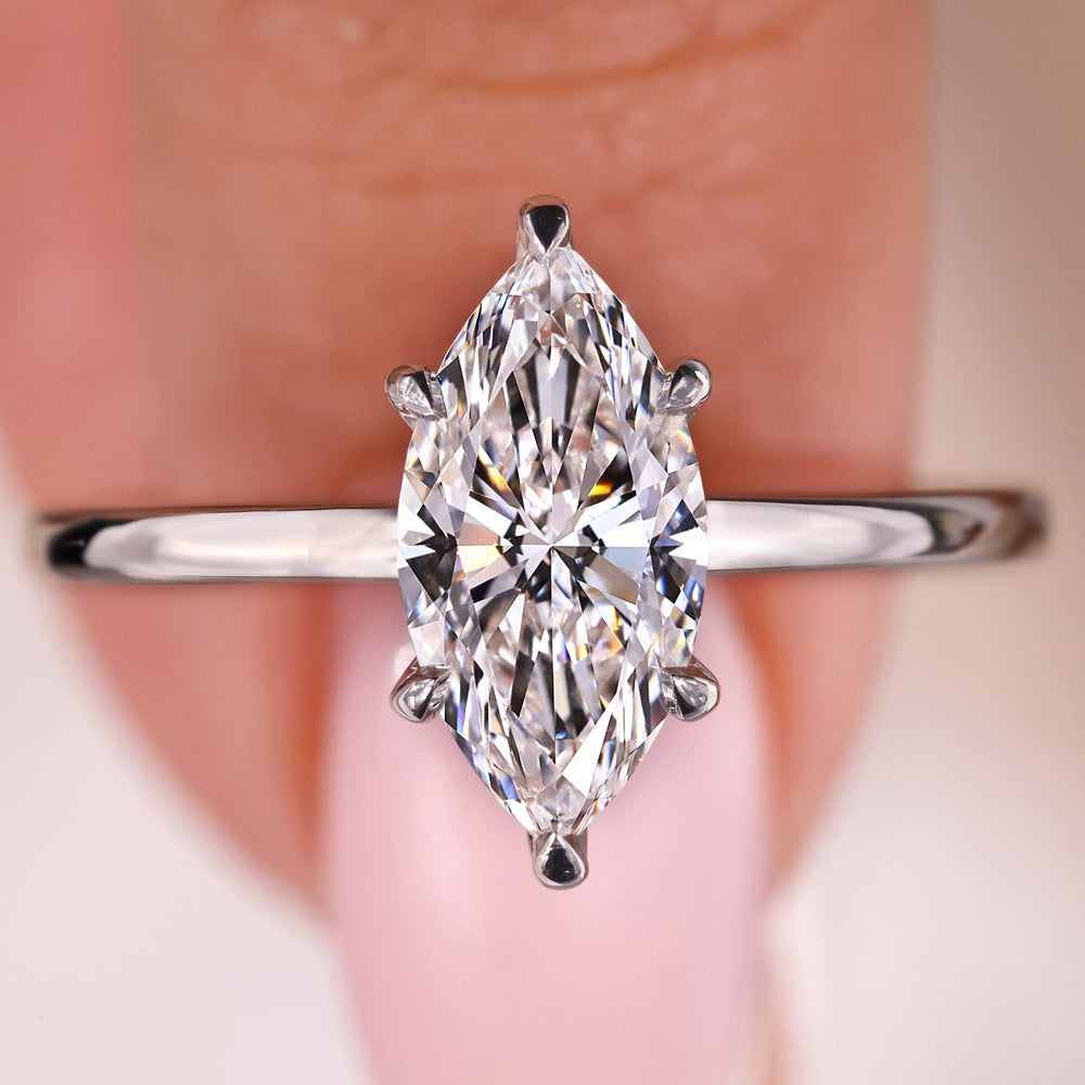 Marquise ring featuring a solitaire diamond centerpiece.