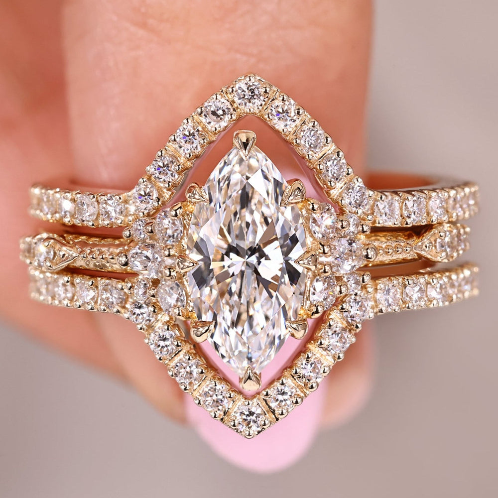 Marquise engagement ring with wedding band in cluster engagement ring.