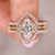 Marquise engagement ring with wedding band in cluster engagement ring.
