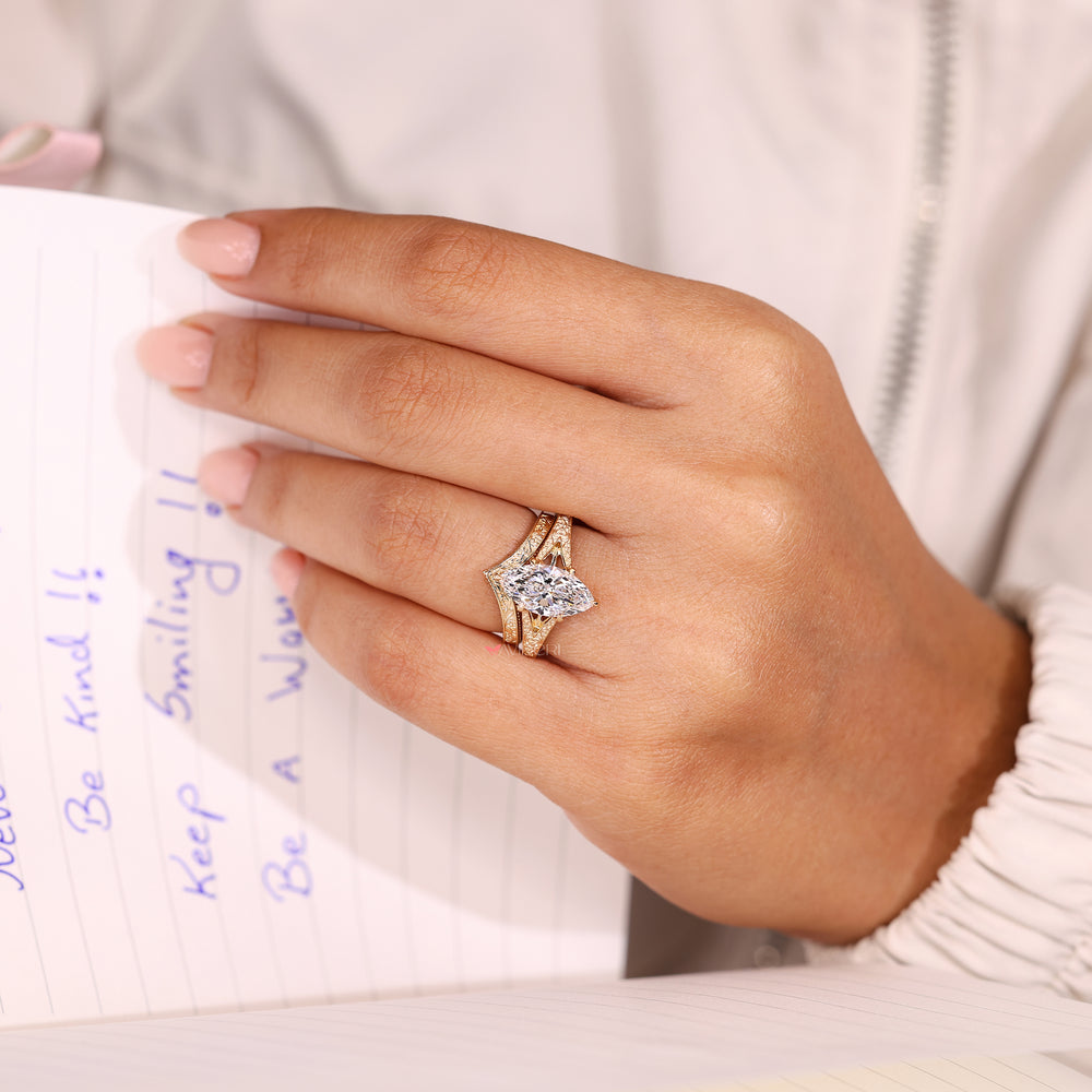 Engagement ring with art deco filigree band.
