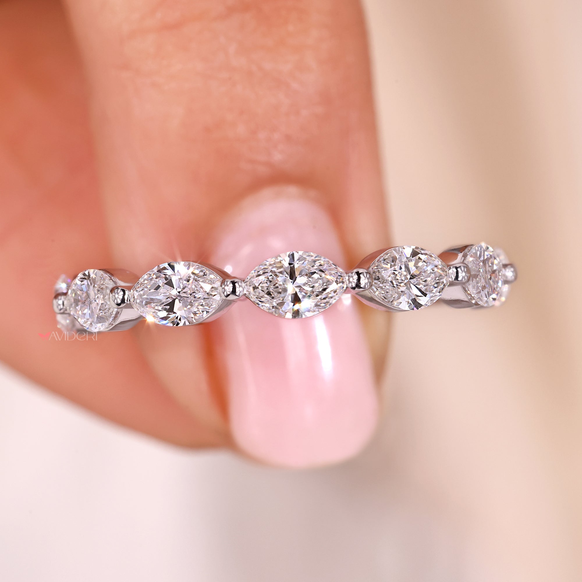 Custom wedding band in marquise diamond wedding band.