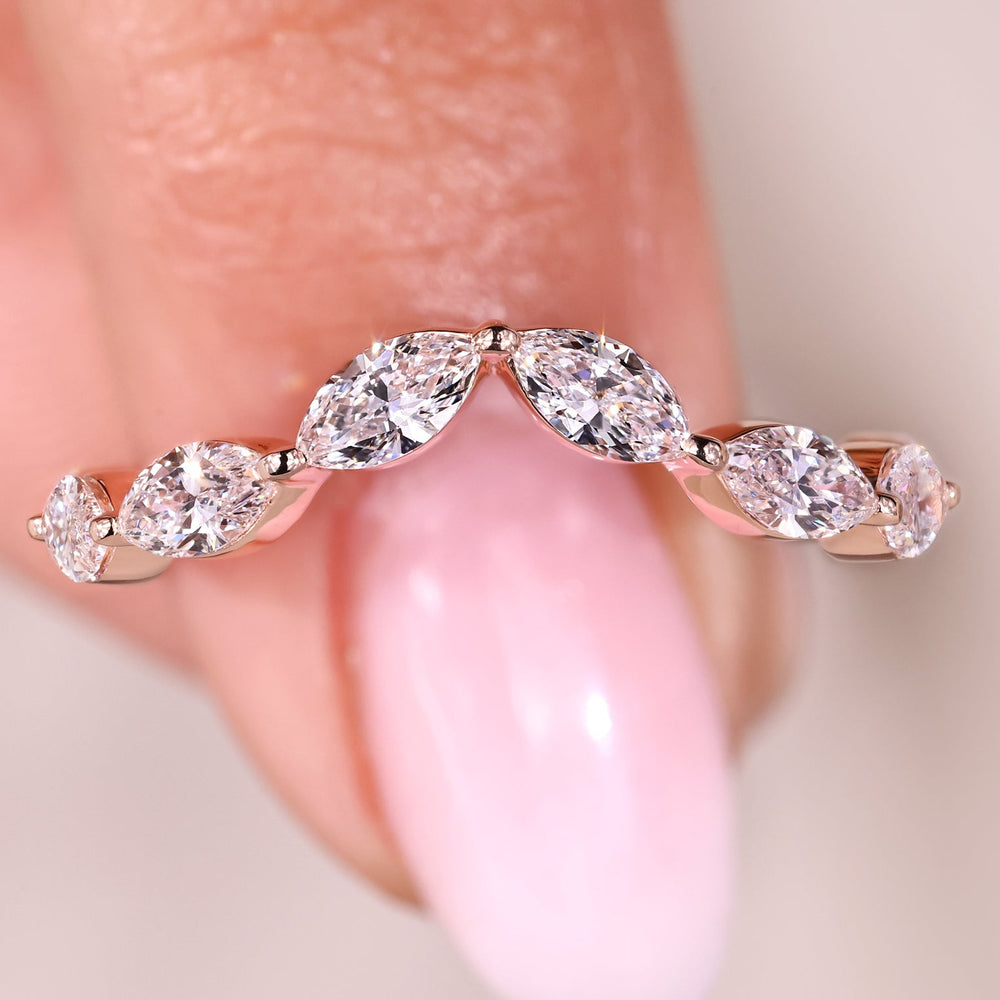 Two tone diamond wedding band in rose and white gold.
