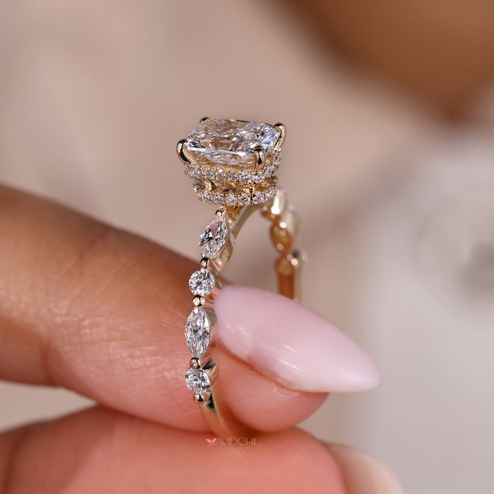 Double hidden halo engagement ring with radiant cut and pave diamonds.
