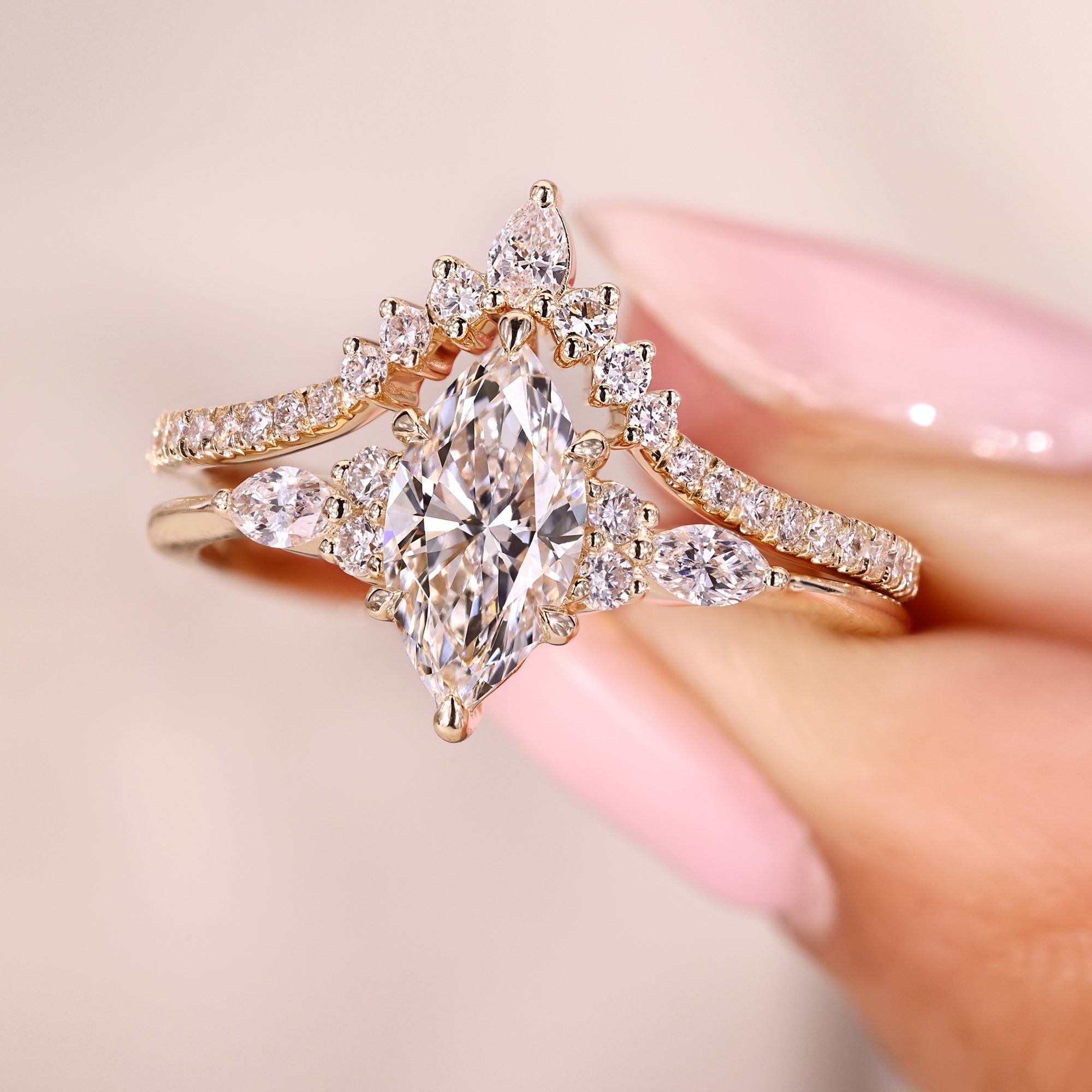 Pear cut diamond band paired with a yellow gold set.