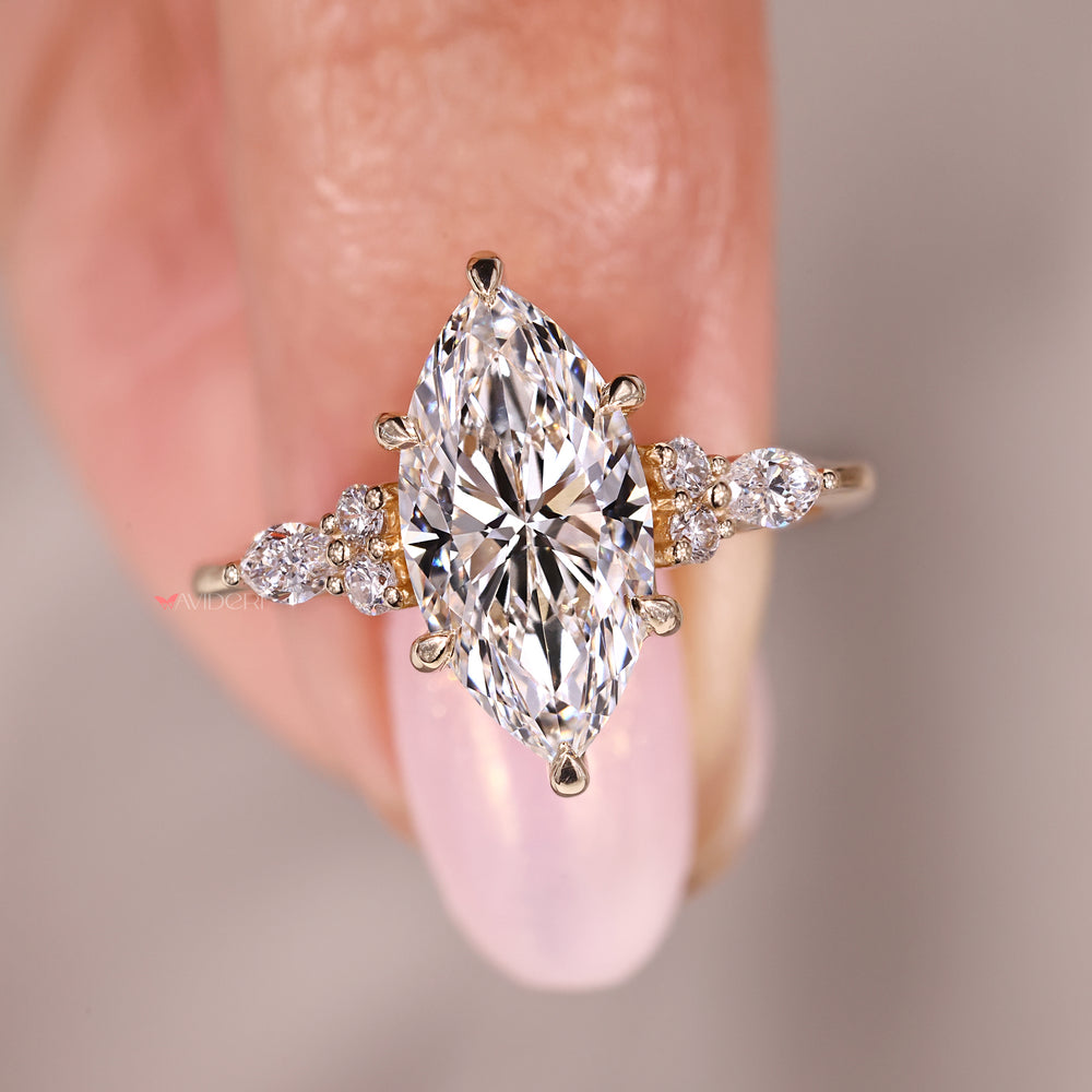 7 stone diamond ring offers bold sparkle across band.