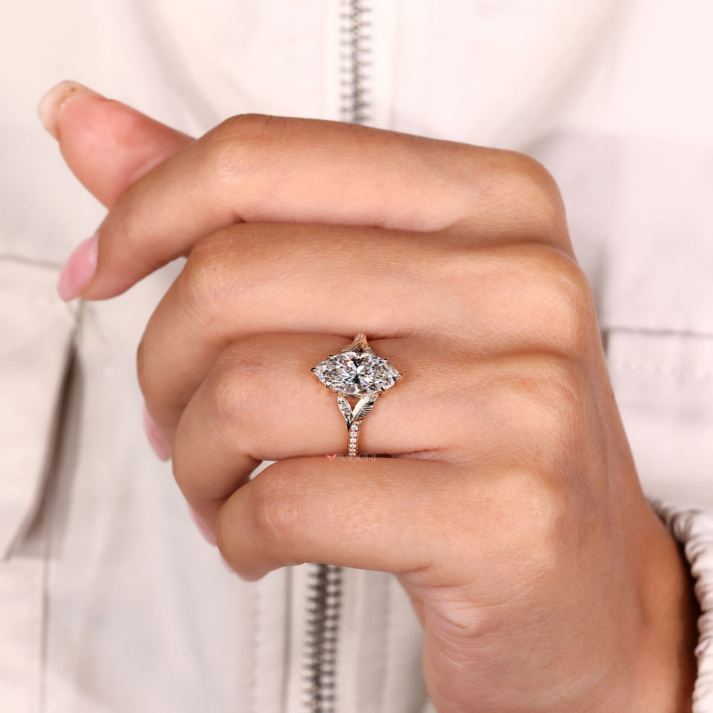 Nature inspired ring with split leaf shank and pave
