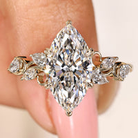 Marquise Cut Nature Inspired Engagement Ring With Side Stone Style