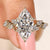 Nature inspired engagement ring with marquise center lab grown diamond

