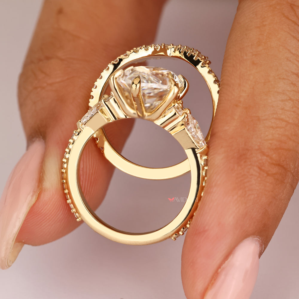 Kite side stone Dutch marquise diamond ring.
