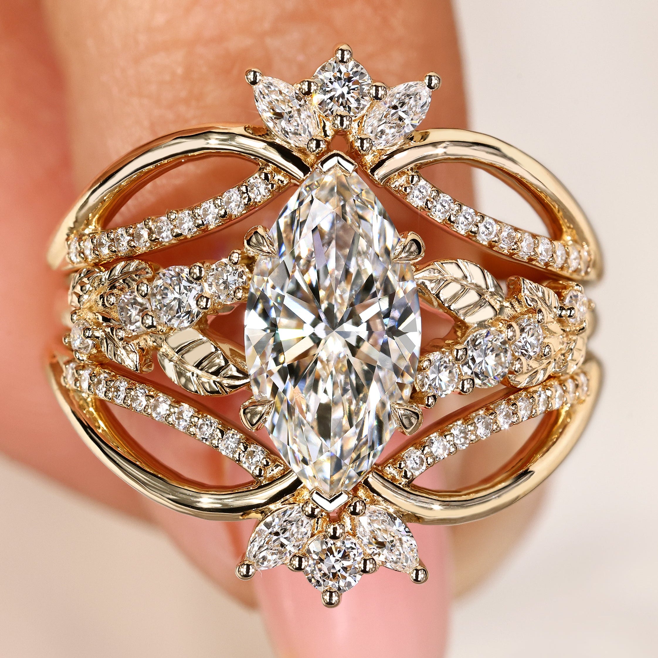 Marquise diamond engagement ring with matching wedding band set
