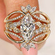 Marquise diamond engagement ring with matching wedding band set
