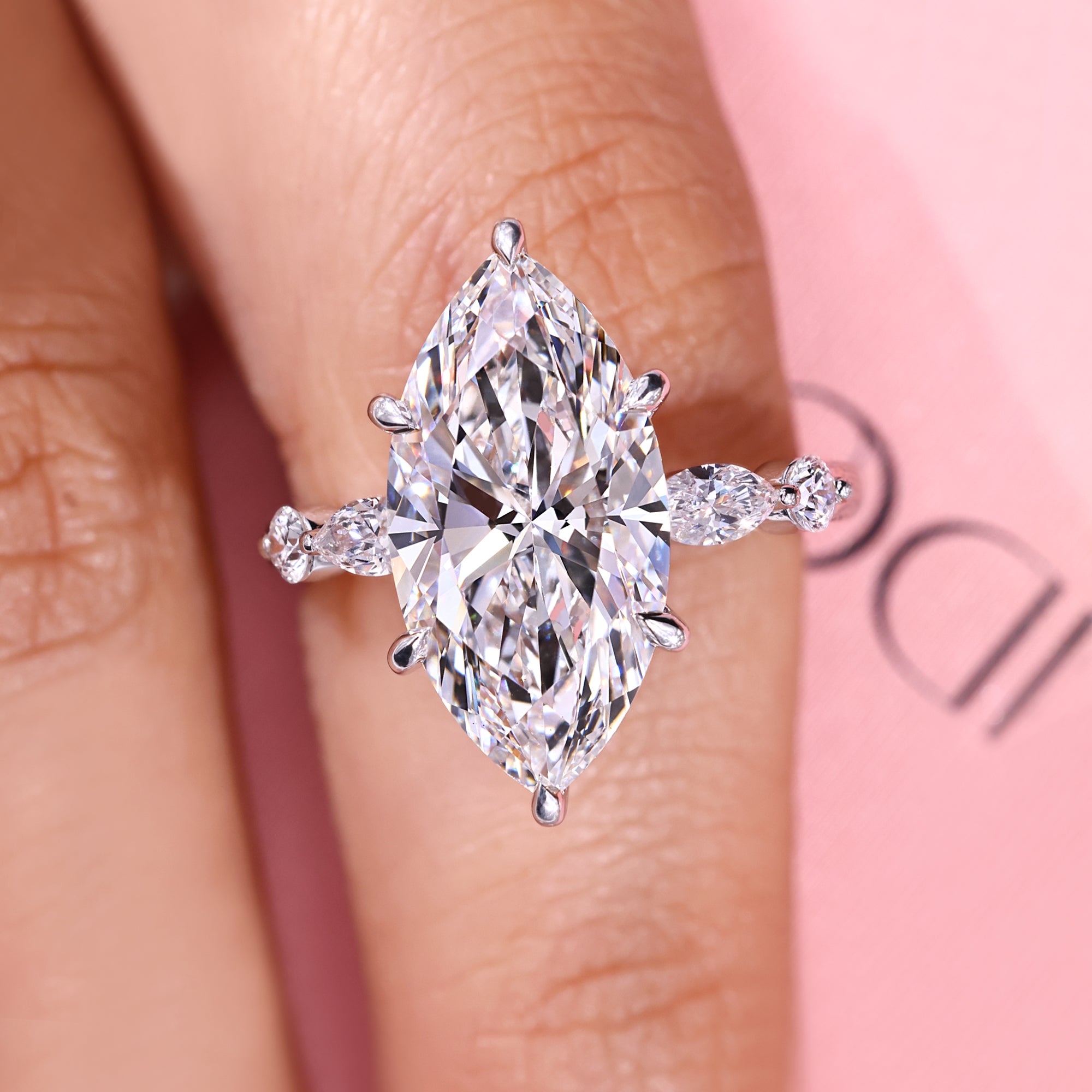 Handmade ring with marquise and round diamond stones.