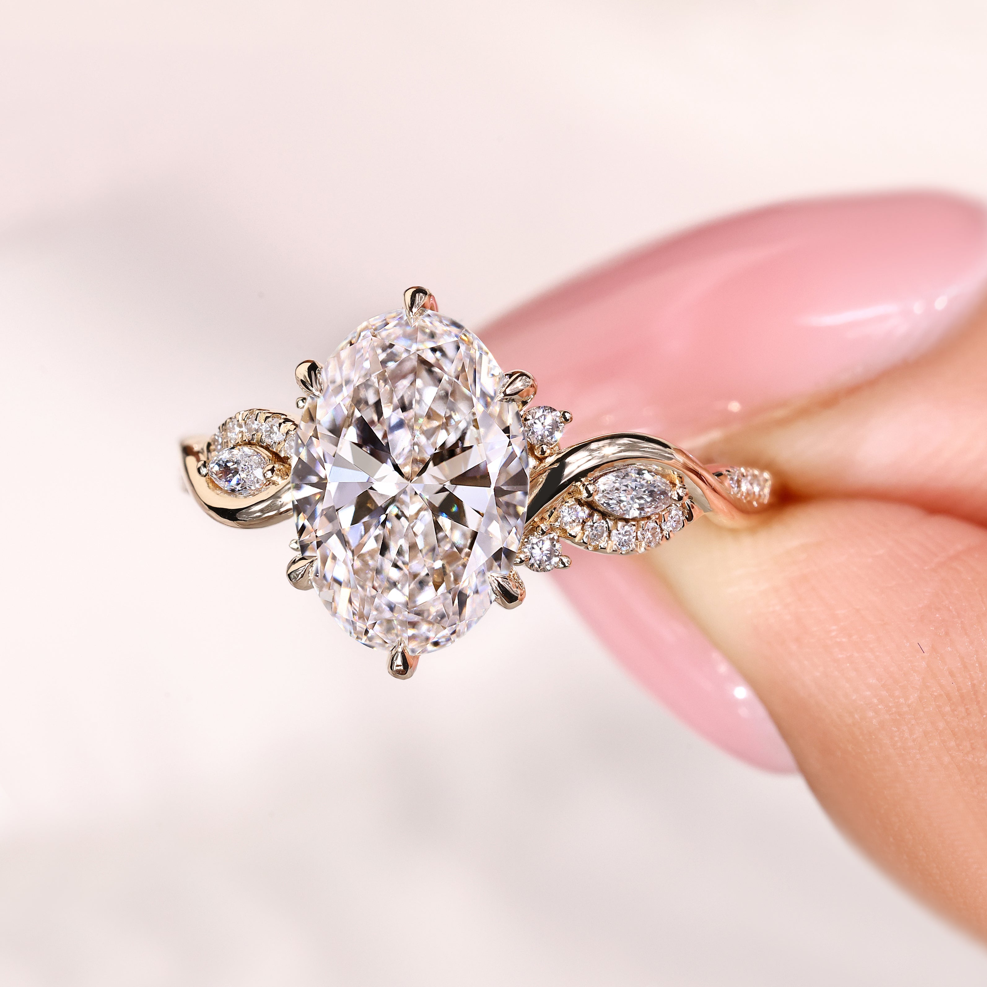Oval cut diamond ring with half twisted shank and pavé
