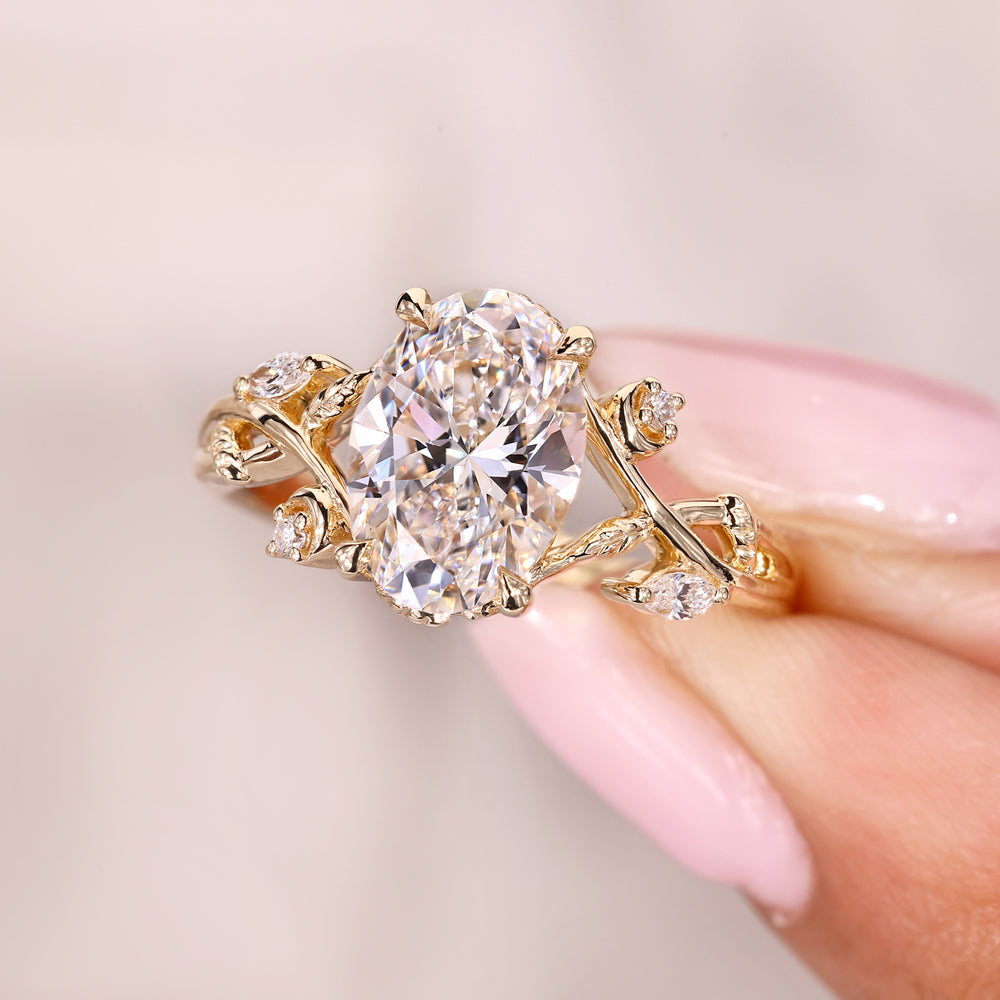 Avideri Oval Cut Diamond Ring with Marquise Side Stones.