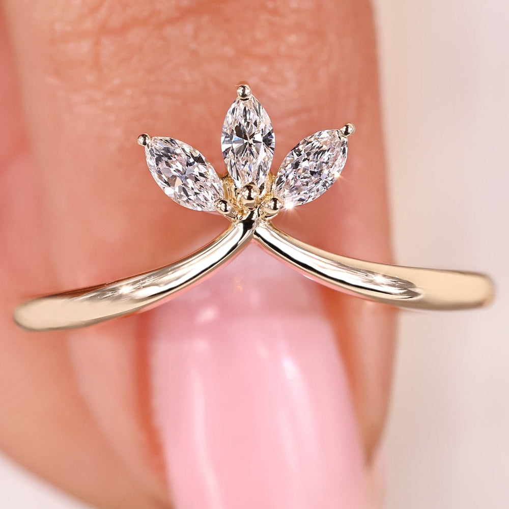 Marquise lab-grown diamond wedding band in yellow gold.