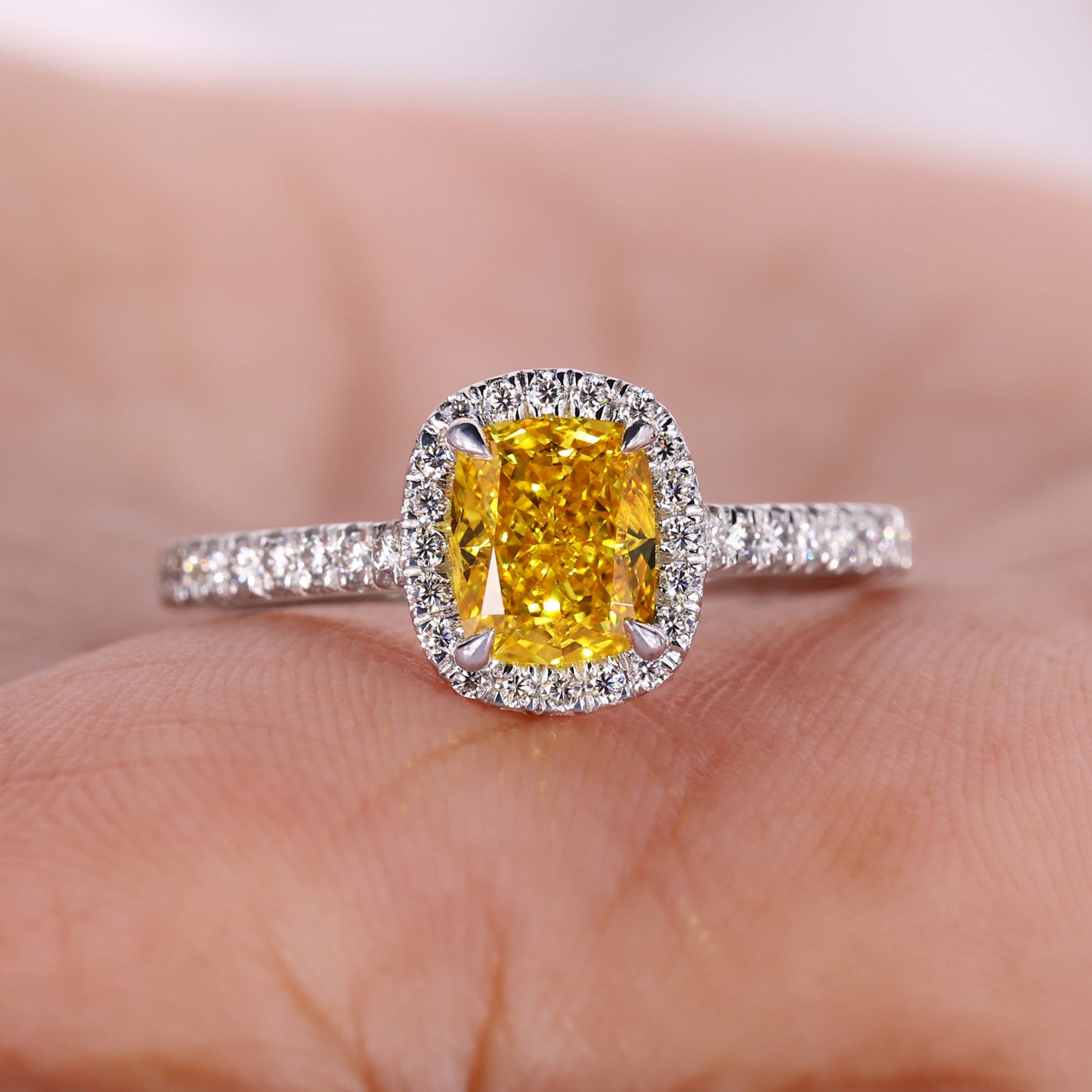 Cushion halo engagement ring featuring intricate craftsmanship and sparkling brilliance.
