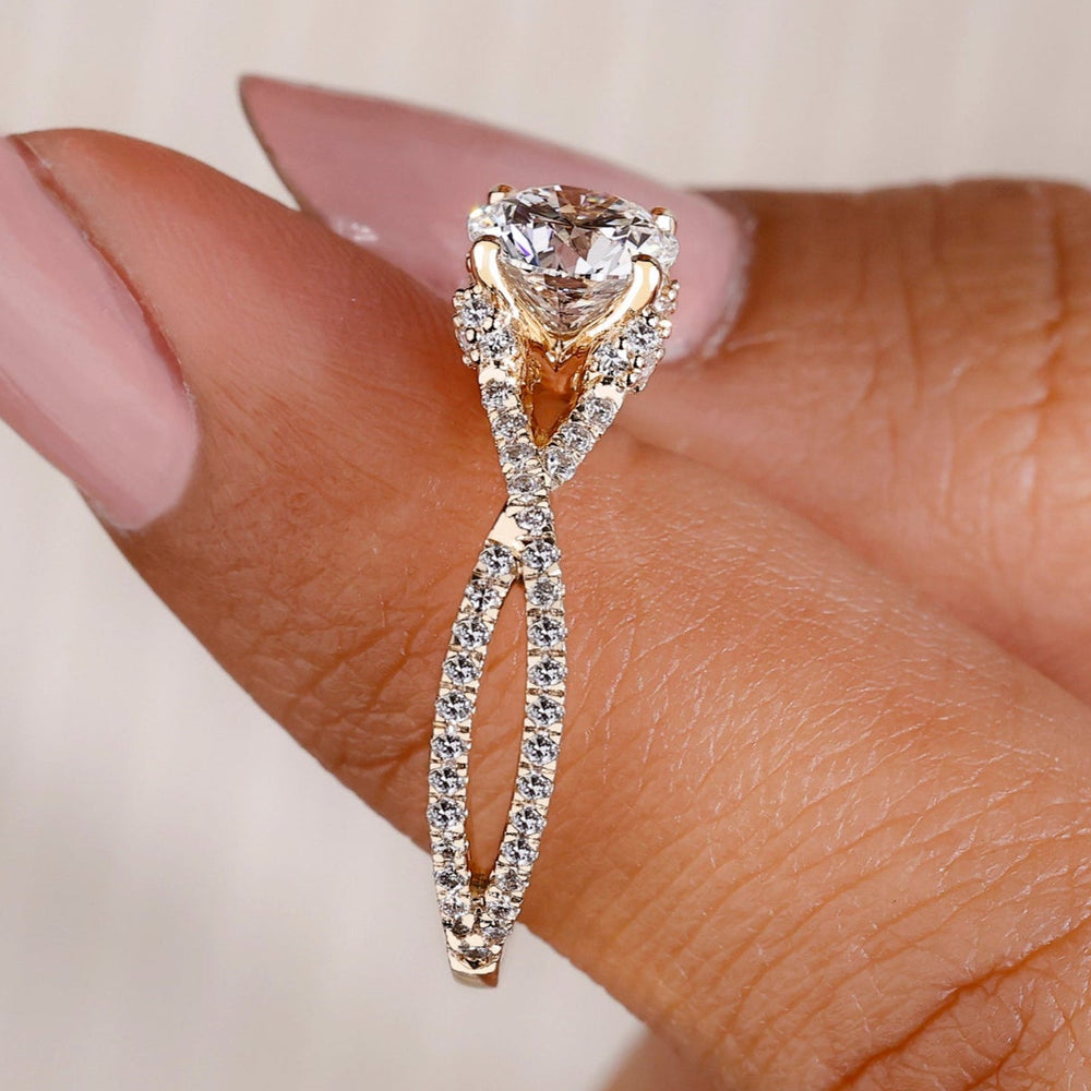 Round diamond engagement ring twisted pave ring.
