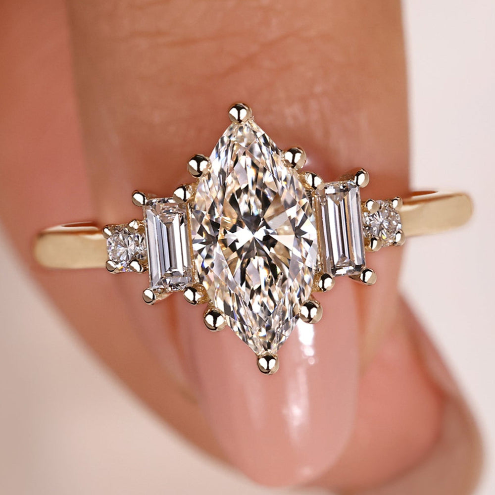 Marquise engagement ring with a lab-grown diamond.
