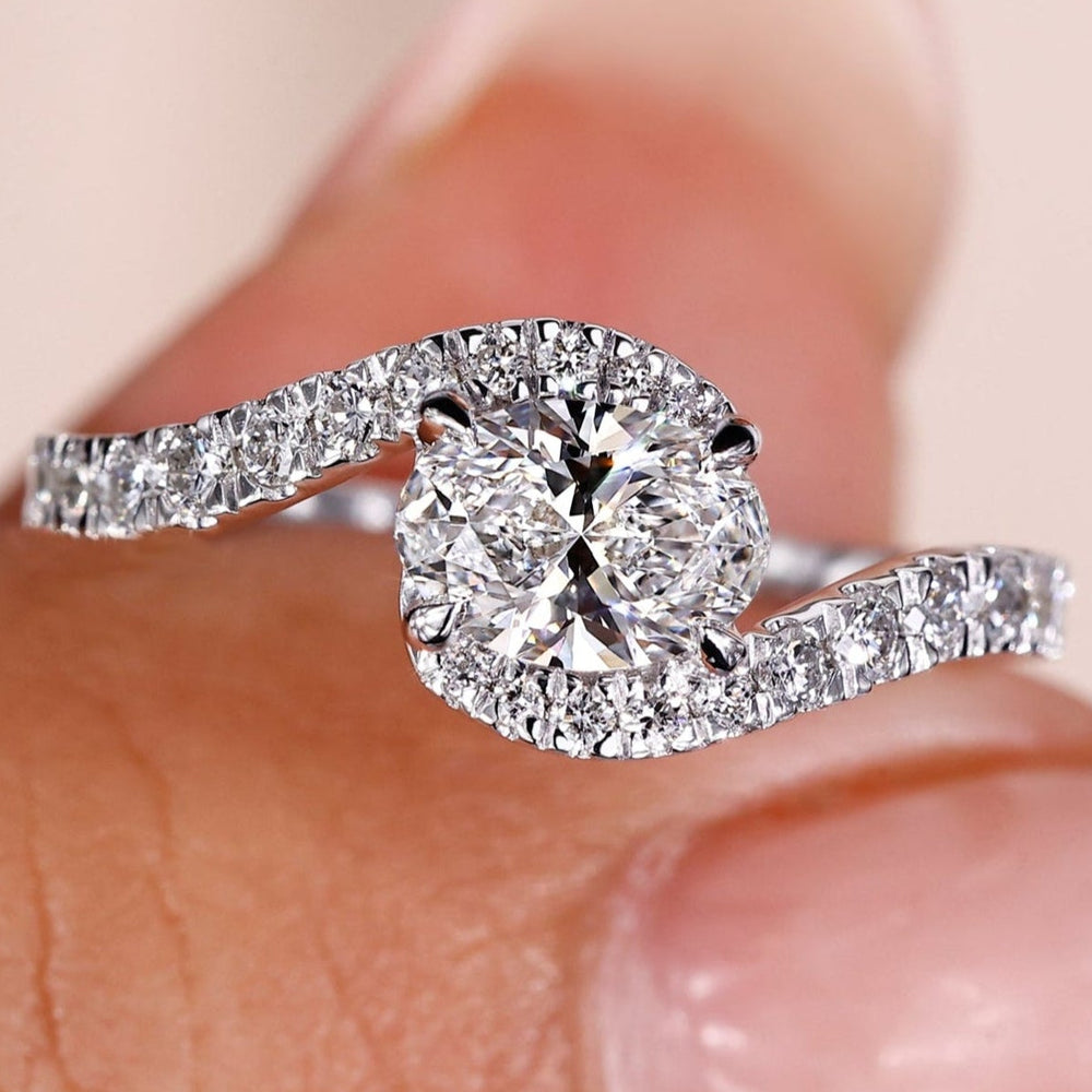 Elegant oval engagement ring with a stunning diamond design.
