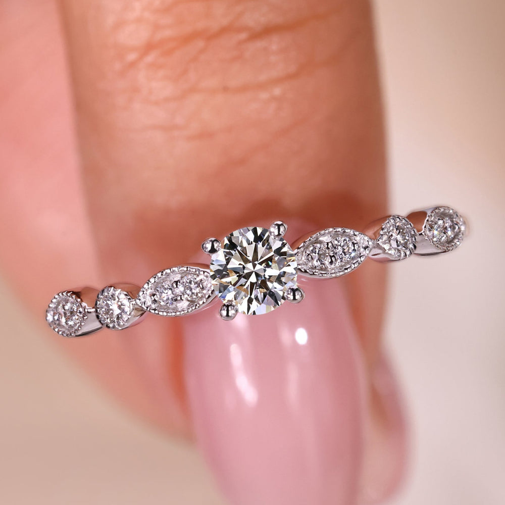 Marquise style ring with an elegant twist and refined craftsmanship.
