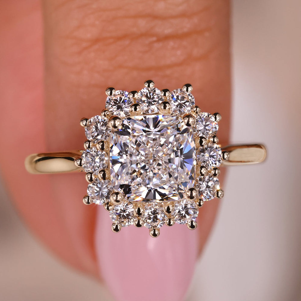Stunning cushion cut diamond ring with a classic and timeless design.
