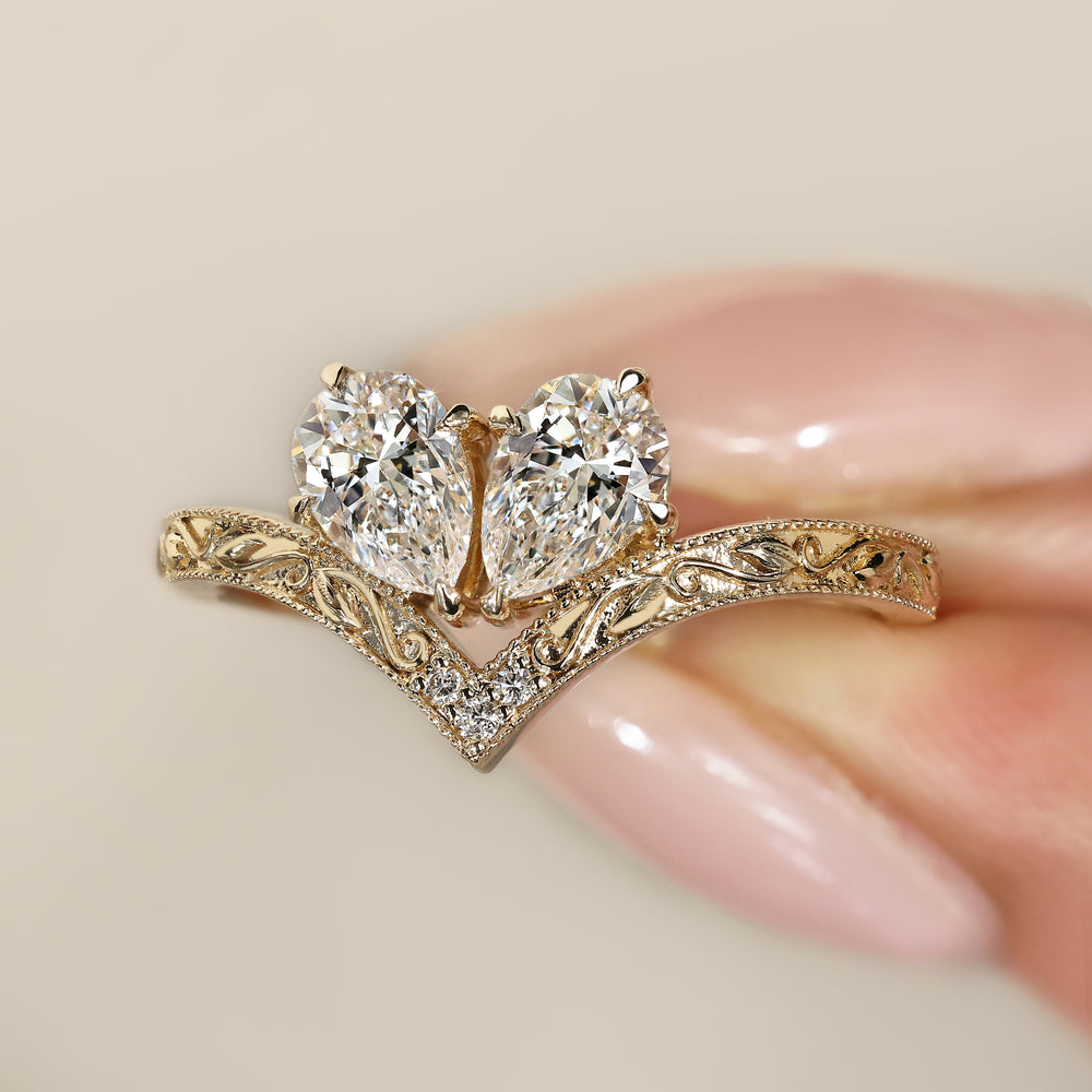 Vintage toi et moi ring with milgrain detailing.

