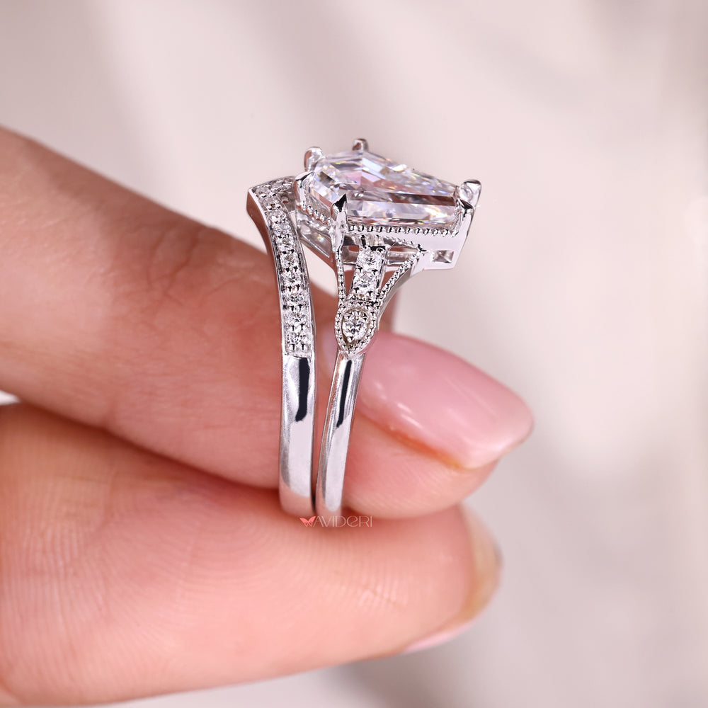 Art deco engagement ring with curved wedding band in a matching bridal set.