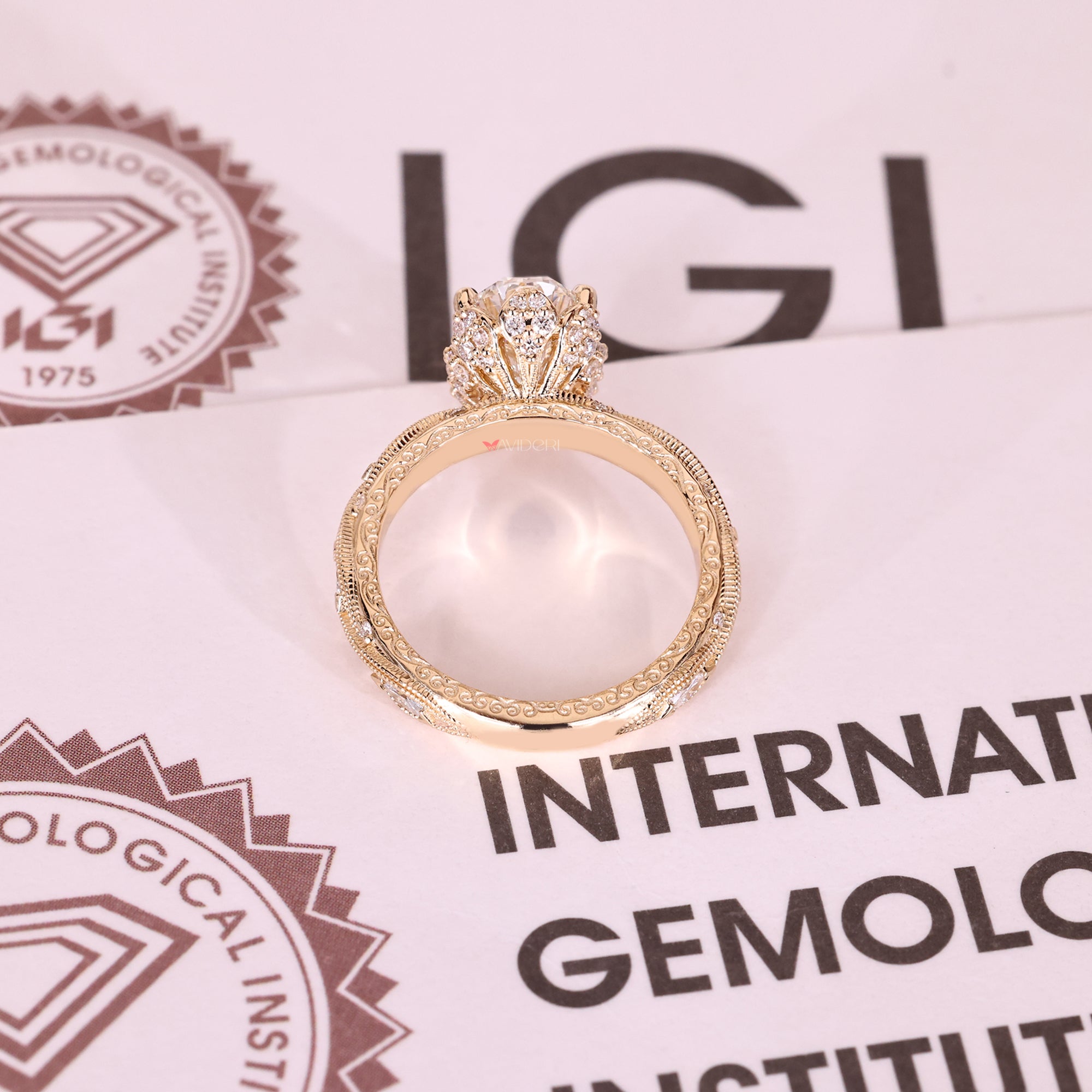 Oval ring with floral hidden halo pave style.
