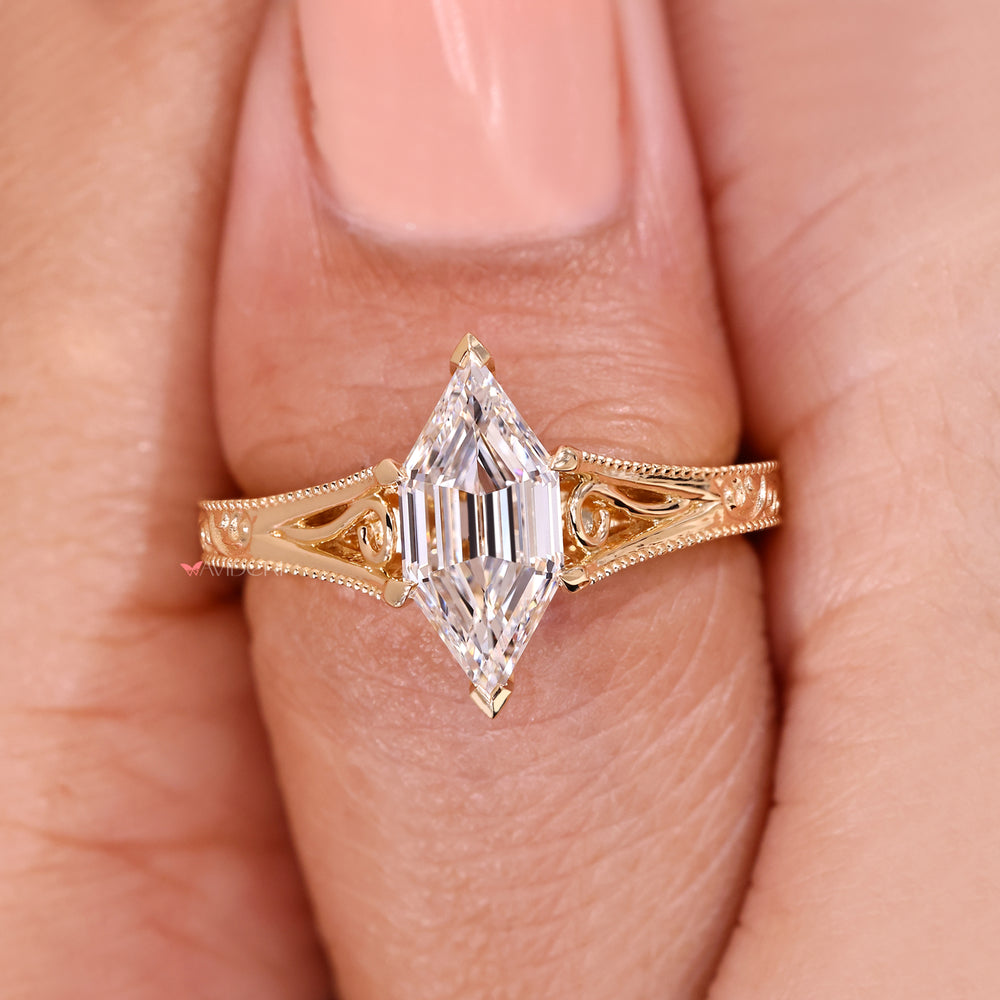 Lab grown hexagon diamond ring with engraving.
