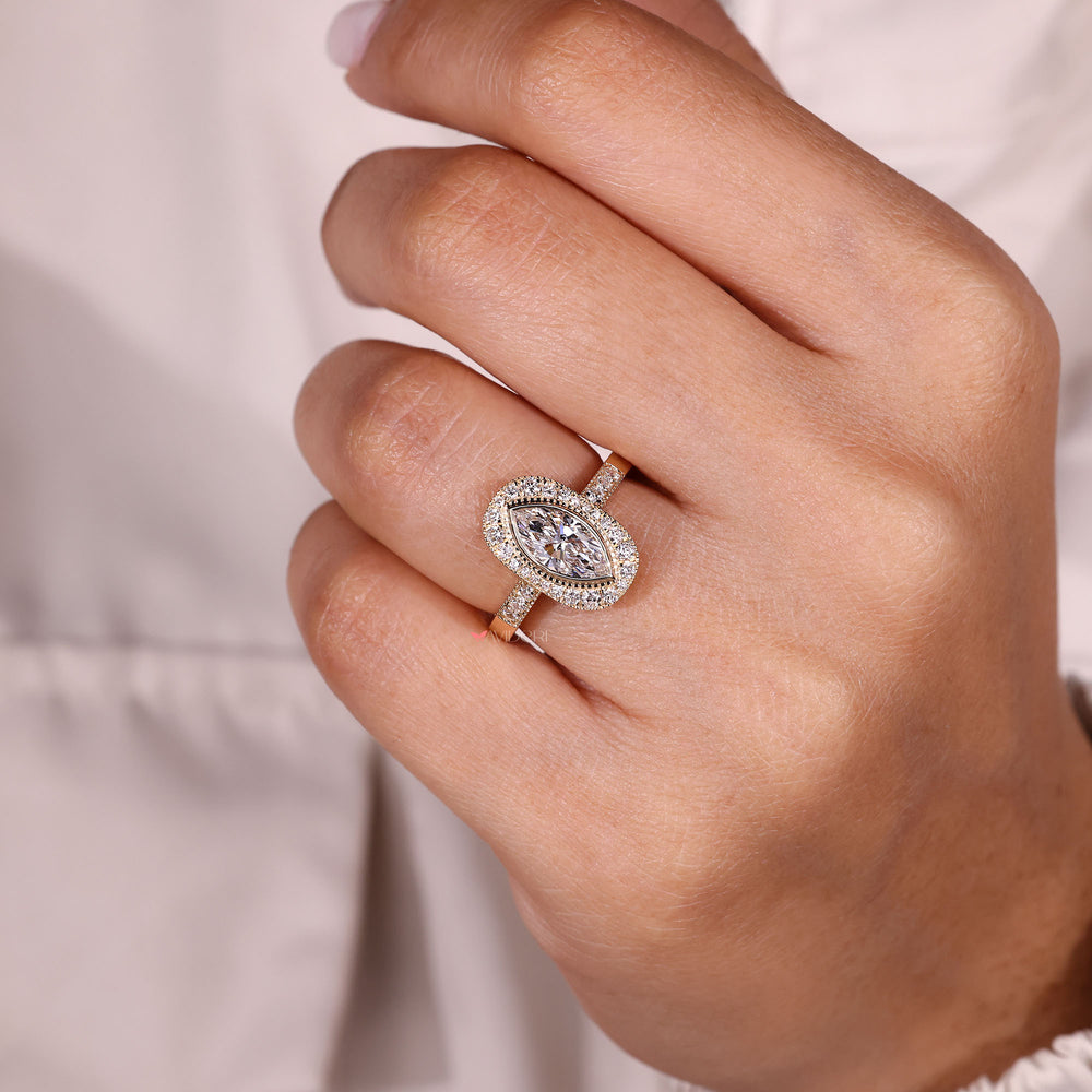 Elegant marquise halo diamond ring.
